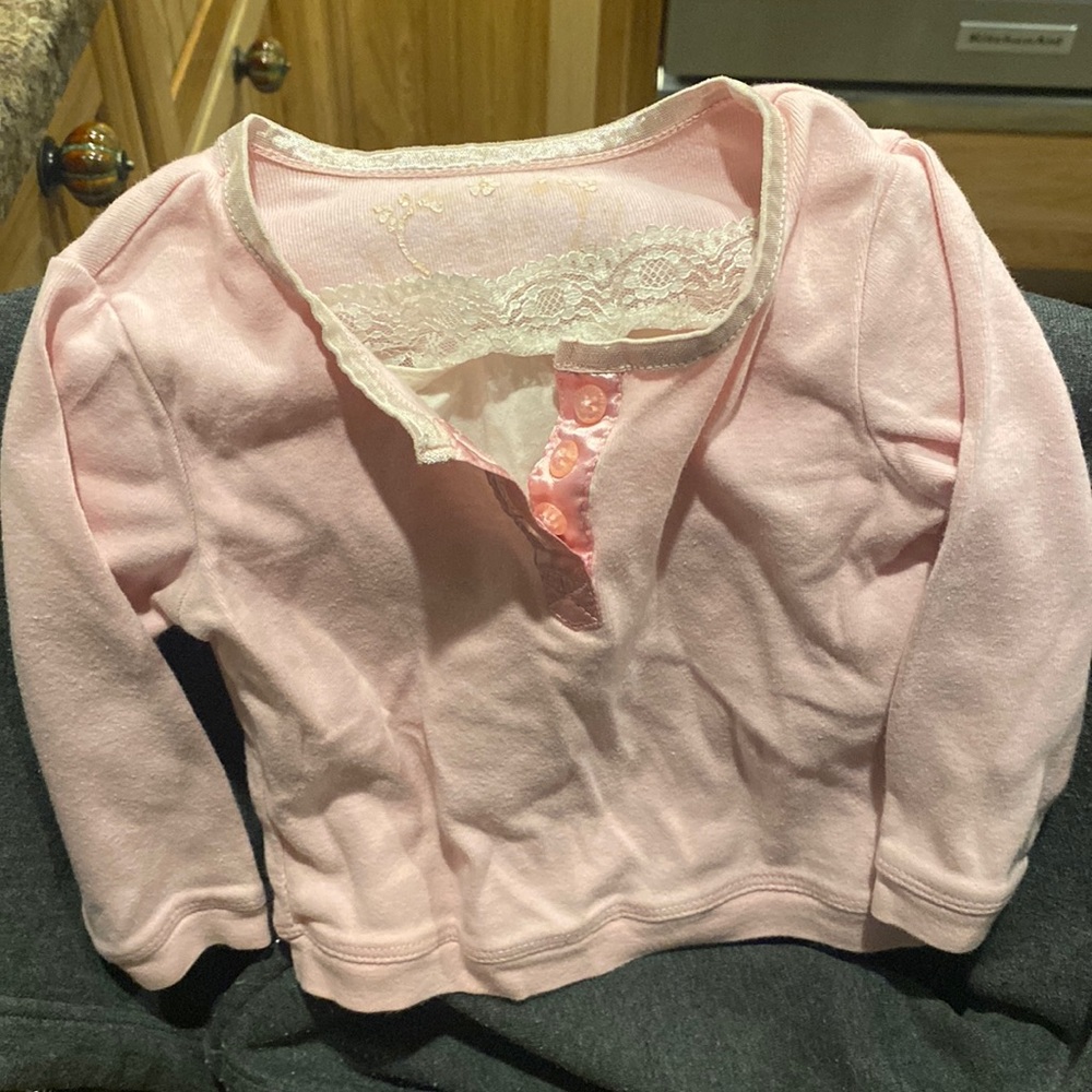 Pink shirt with white lace detail